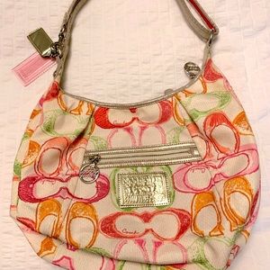 Coach handbag beautiful bright colors.  Open to offers 😉